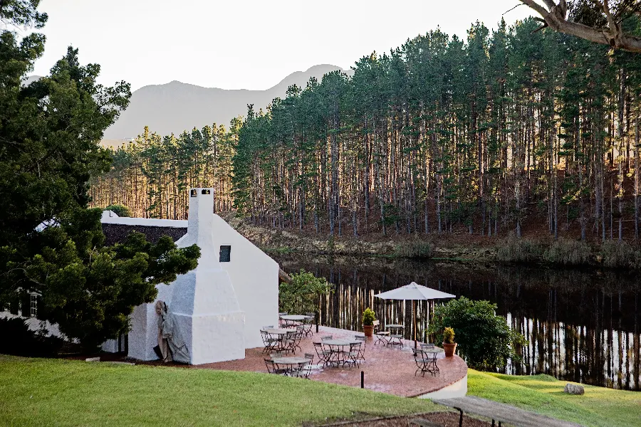 The whitewashed tasting room of Hamilton Russell Vineyards beside the water